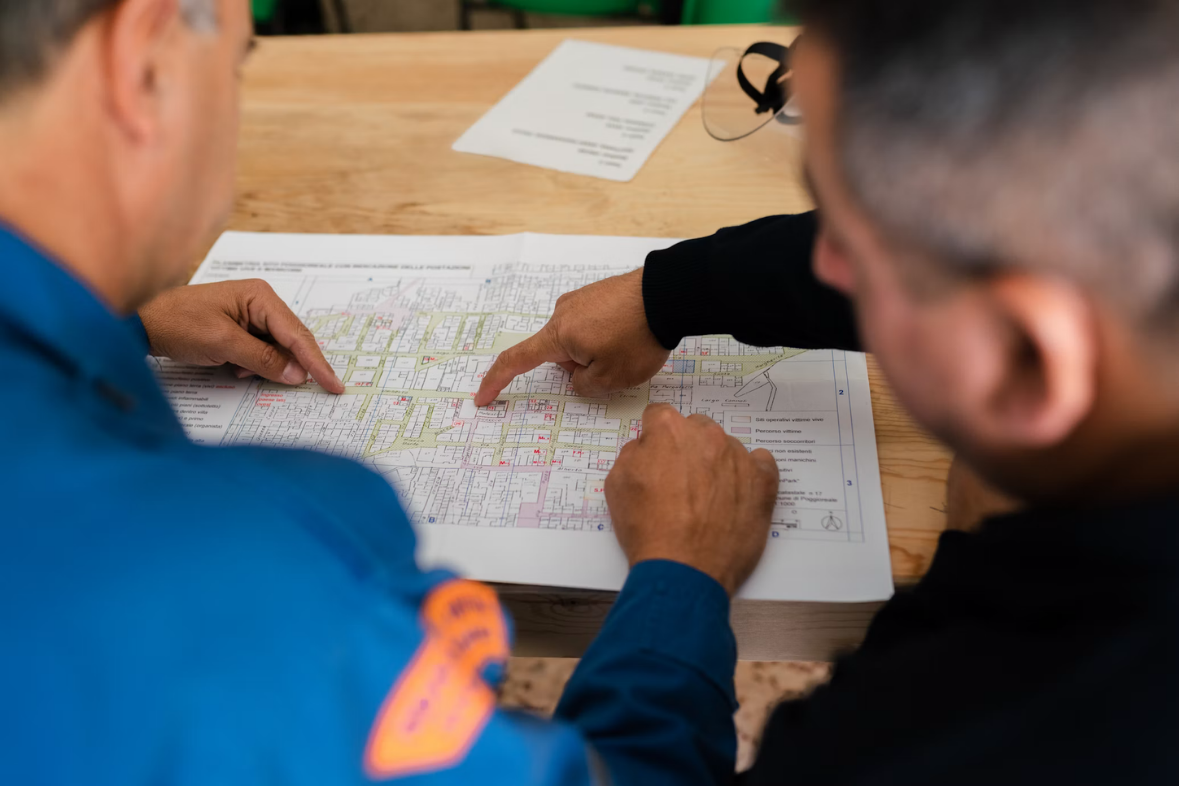 Engineers reviewing plant drawings
